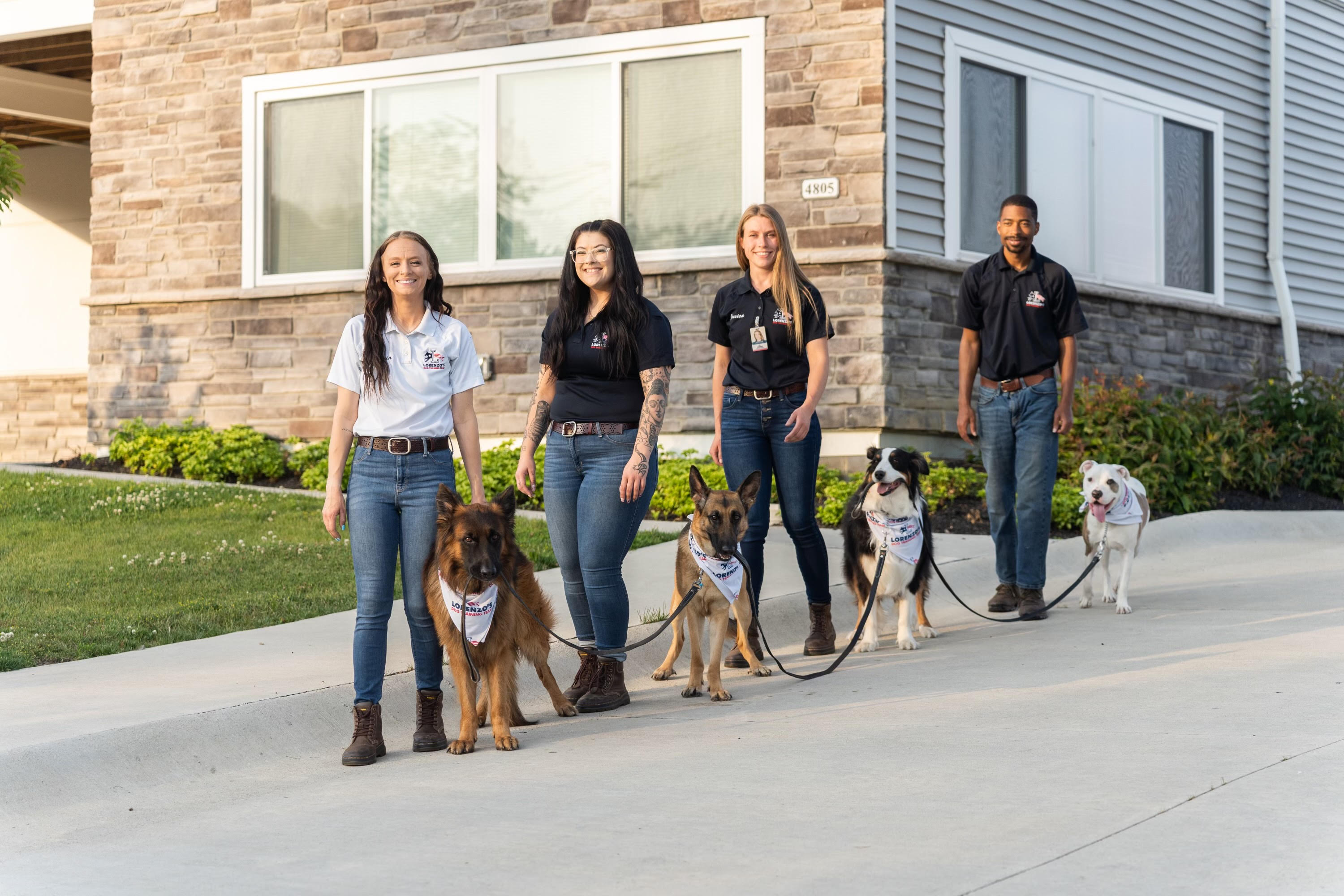 The Lorenzo's team and their dogs outside the Cleveland headquarters
